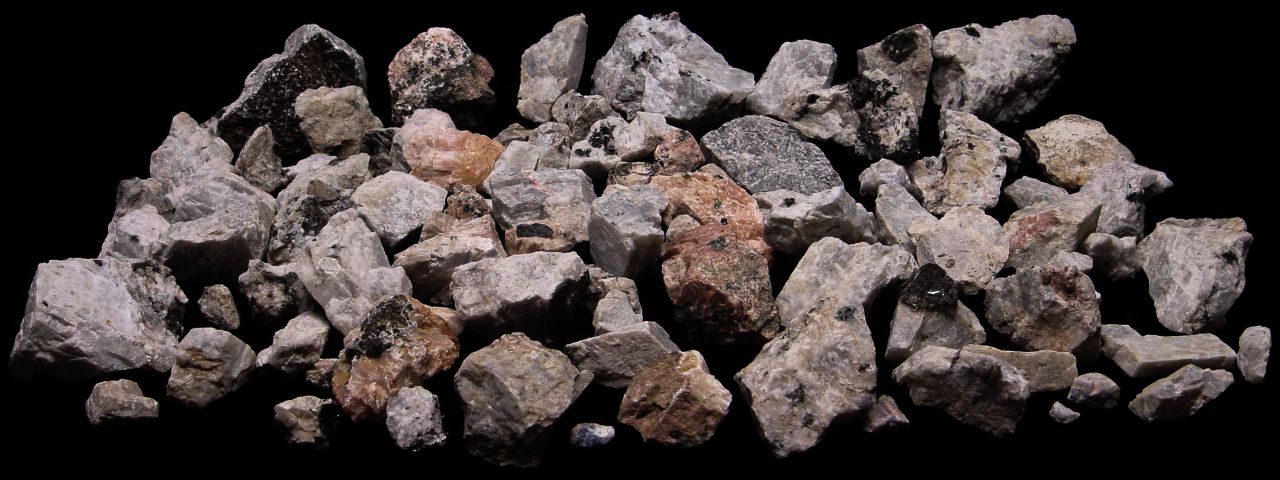 Minerals collected at the CN Dump including feldspar, biotite, calcite, blue sodalite and hackmanite