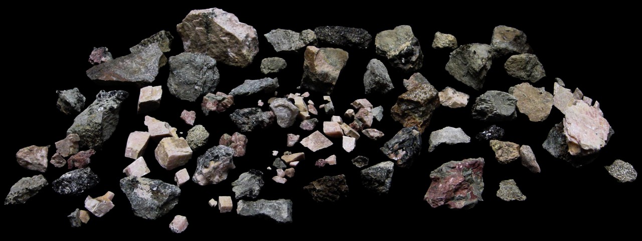 Specimens Collected at the Graphite Road Cut : Calcite, diopside crystals, feldspar, phlogopite, actinolite
