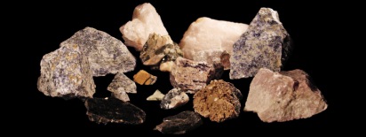 Minerals collected at the Princess Sodalite Mine Rock Farm including rose quartz, blue sodalite, calcite, diopside, mica