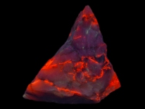 Calcite in quartz, Prescott, Arizona (shortwave UV)
