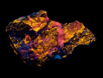 Apatite, calcite - Holcomb Valley, California (shortwave UV)