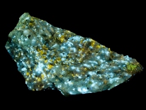 Diopside (fl. blue), phlogopite (fl. yellow) - Newcomb, NY (shortwave UV)