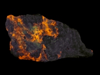 Richterite, sugilite - Wessels Mine, Kuruman, South Africa (shortwave UV)