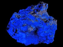 Plancheite, quartz, fluorite - Reymert Mine, Pinal County, Arizona (longwave UV)