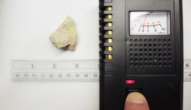 Andersonite - Moab, Utah, Geiger counter, Beta particles, about 1 inch from Geiger counter beta slots